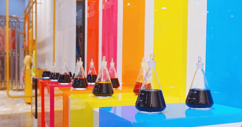 Eco-friendly ink bottles with green leaf accent